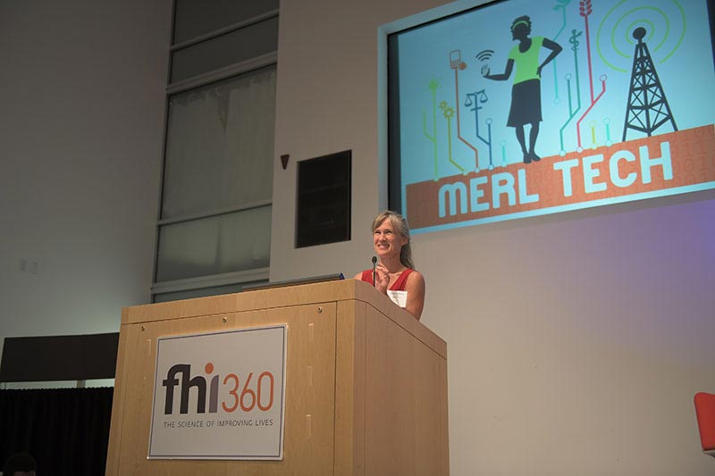 Linda, the founder of MERL Tech, at the speaker's podium